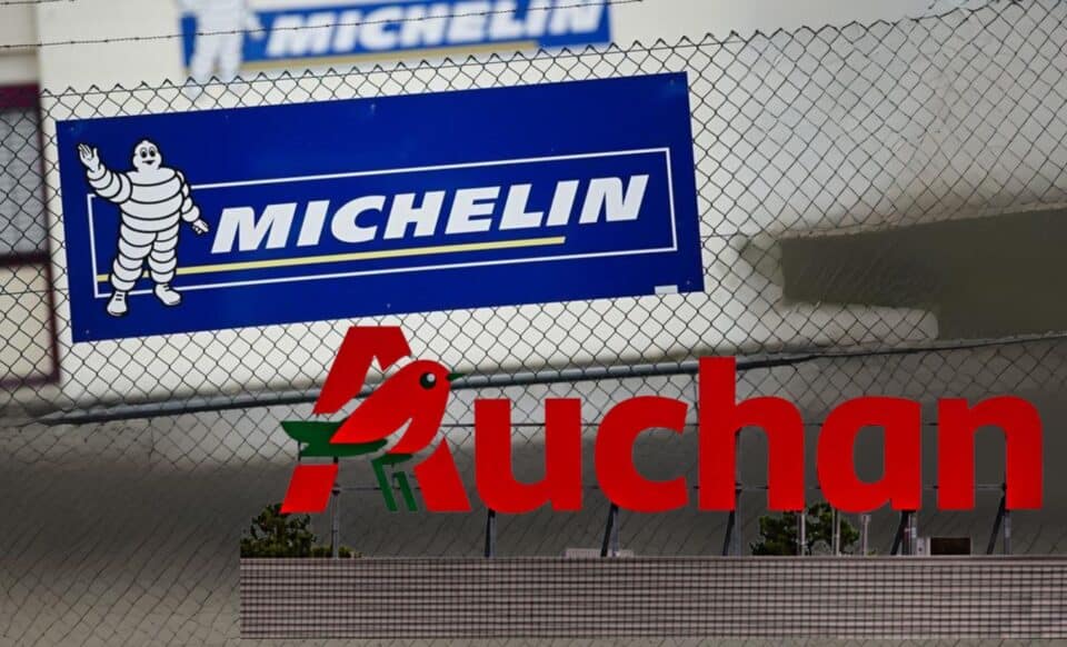 Les logos des deux entreprises Auchan Et Michelin